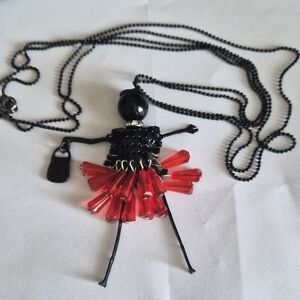Black Doll Pendant Necklace with Red Beaded Skirt